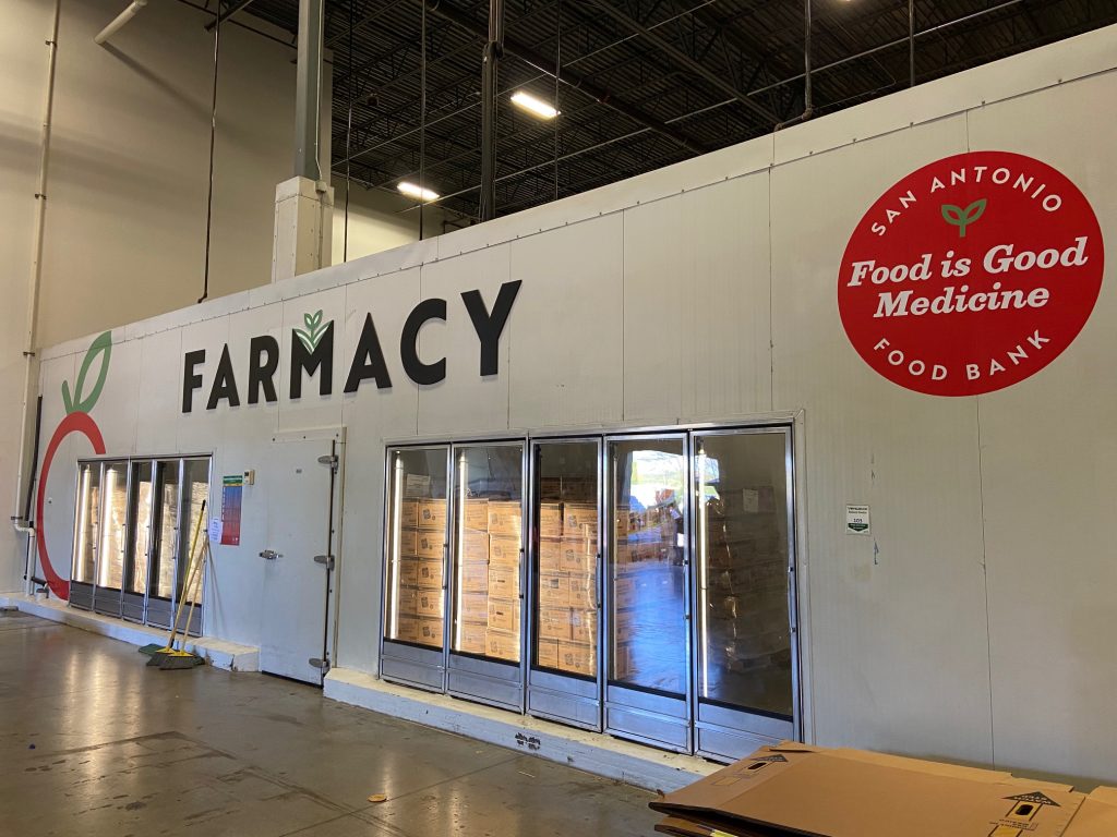Food bank storage with 'Farmacy' sign.