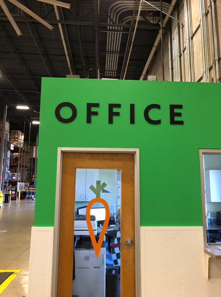 Office with carrot logo on door