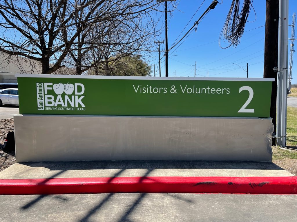 San Antonio Food Bank sign for visitors, volunteers.